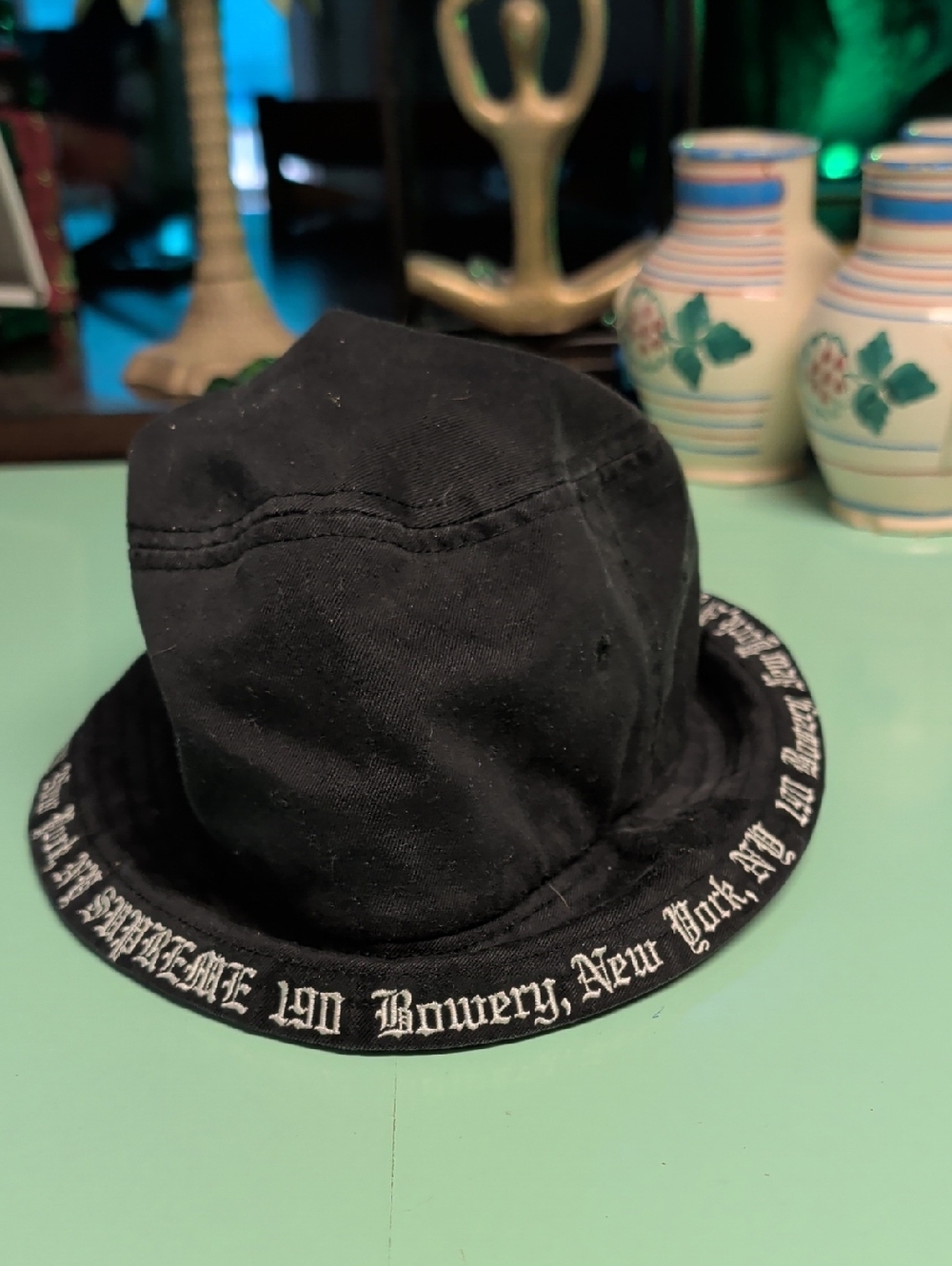 Supreme Black Bucket Hat with White Script Trim
